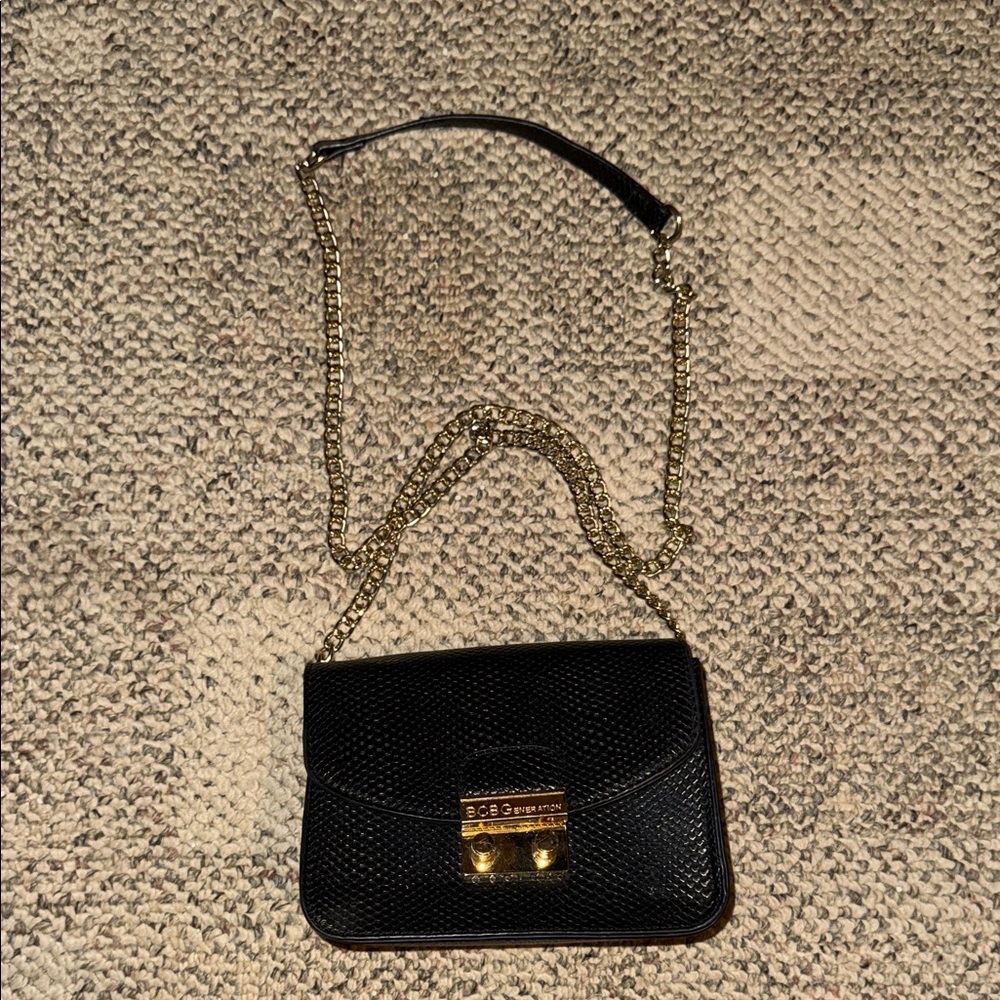 BCBG Elegant Black Crossbody with Gold Accents